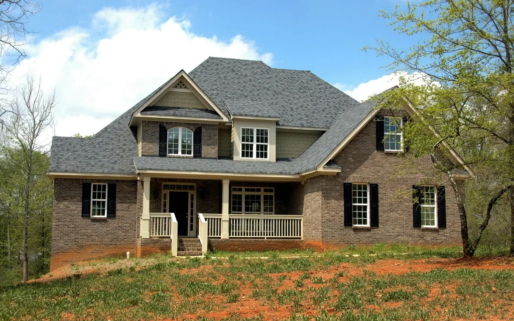 Residential home with a multi-gabled asphalt shingle roof